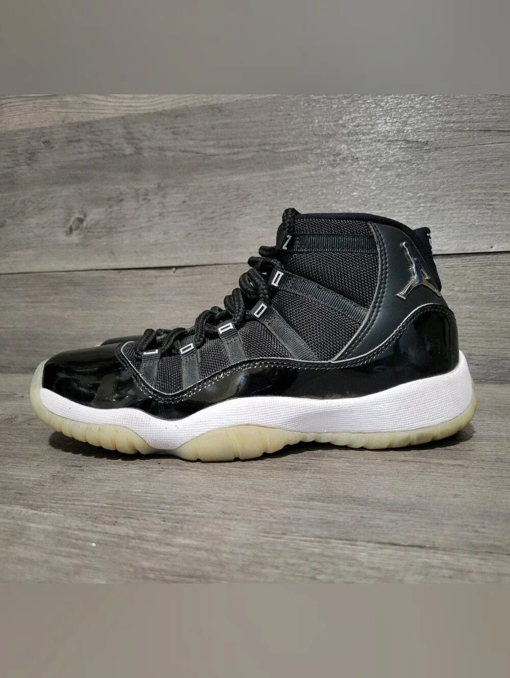 Jordan Kids Black and White High-Top Sneakers